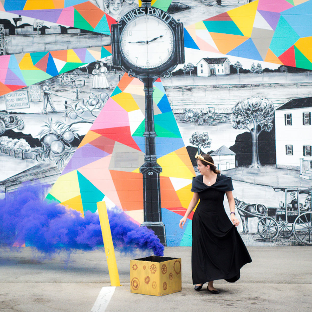 smoke bomb and mural portrait